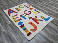UNIKATOWY RĘCZNIE TUFTOWANY DYWAN AKRYLOWY DZIECIĘCY WYCINANY kremowy kolorowy alfabet literki 140x200 cm - obrazek 2